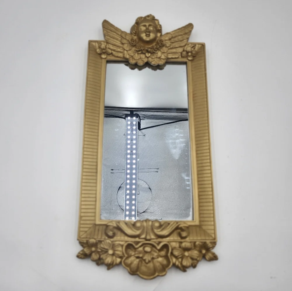 Vintage gold 80s Hollywood Regency Cherub Angel Figural Wall Mirror guilded